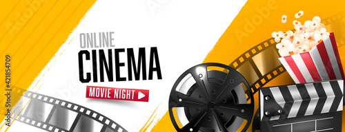 Open clapper board with film strip background