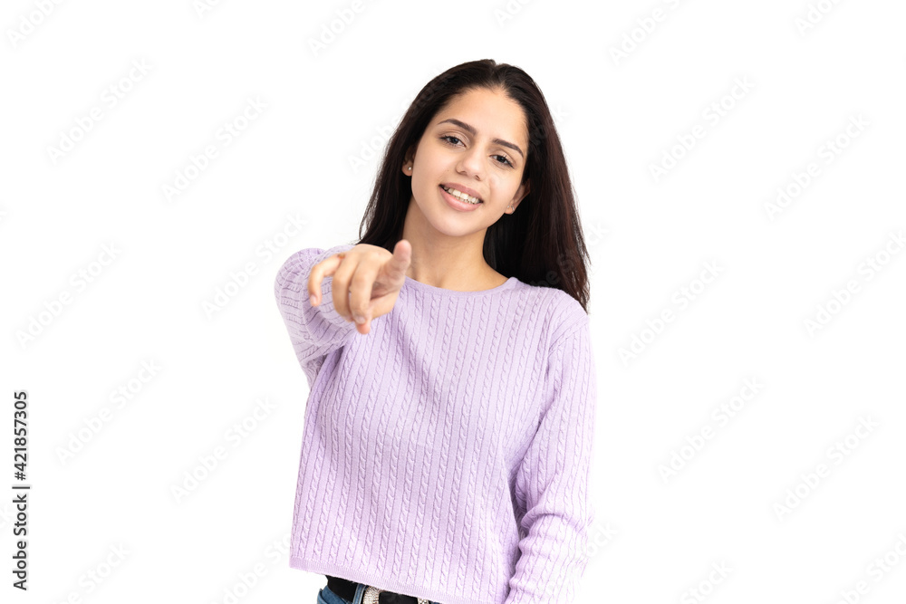 Latin woman pointing with fingers on white background Latin woman pointing with fingers on white background