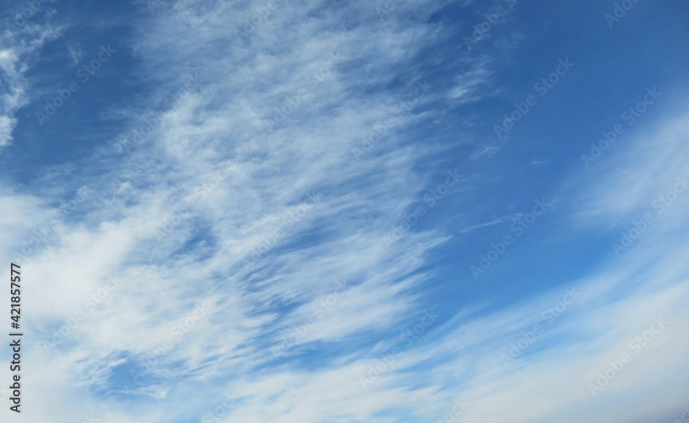 Cirrus clouds in blue sky, natural background Cirrus clouds in blue sky, natural background
