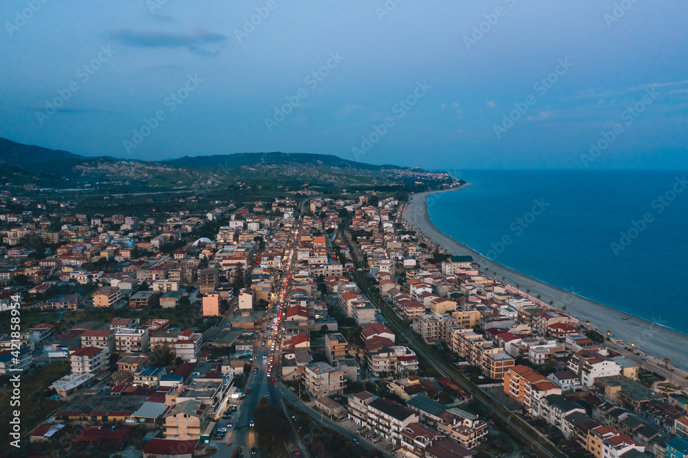 Aerial view of the city of Gioiosa by night. Calabria Italy
