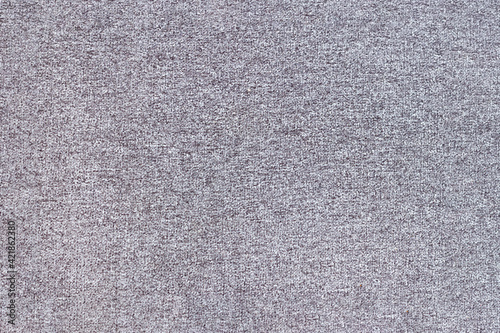 Light gray mottled fabric with small speckles. Uniform neutral gray texture.