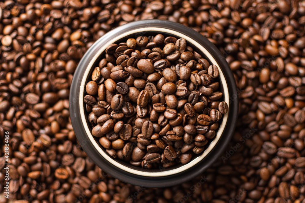 Coffee beans. Coffee beans are spread out on the surface. Coffee beans. Coffee beans are spread out on the surface.
