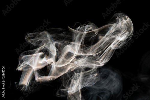 Grey smoke abstract texture, isolated effect with dark background