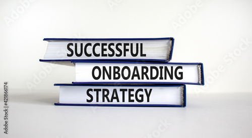 Successful onboarding strategy symbol. Books with words 'Successful onboarding strategy' on beautiful white background. Business and successful onboarding strategy concept. Copy space.