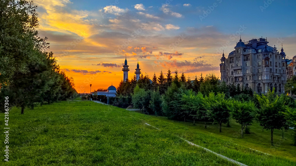 Sunrise over the river in Kazan, Kremlin Embankment, Irek Mosque, Russia