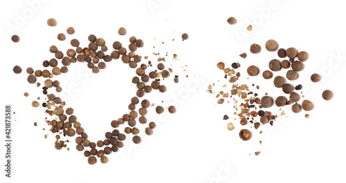 Allspice, pimento spice crushed, Jamaican pepper and shavings in shape heart isolated on white background, top view