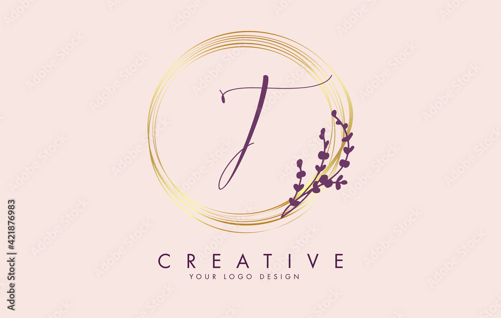 Handwritten T Letter logo design with golden circles and purple leaves ...