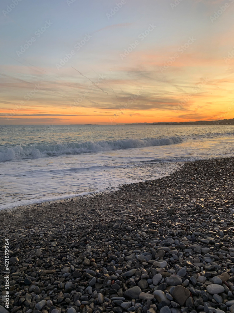 Sunset on the French Riviera (Cote d'Azur). Pebble beach. Nice