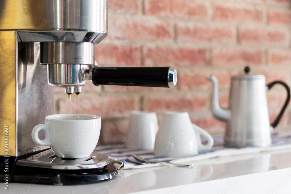 Professional home coffee maker in modern kitchen Professional home coffee maker in modern kitchen