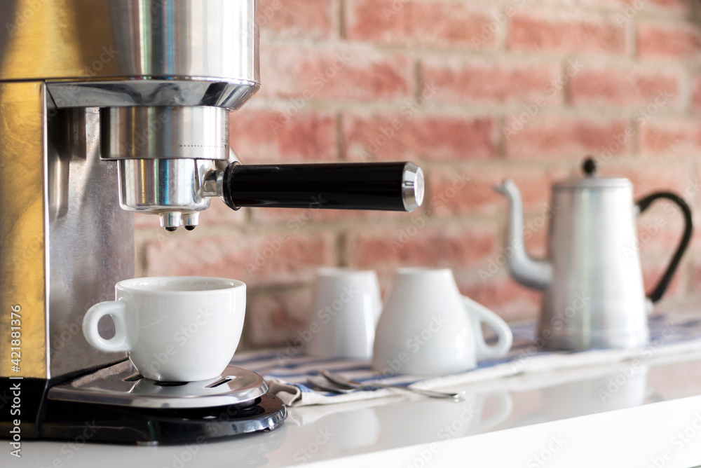 Professional home coffee maker in modern kitchen Professional home coffee maker in modern kitchen