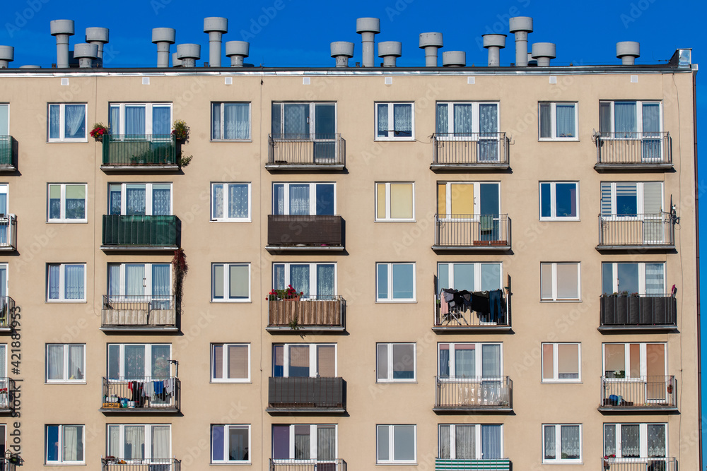 
apartment block against the sky in the afternoon