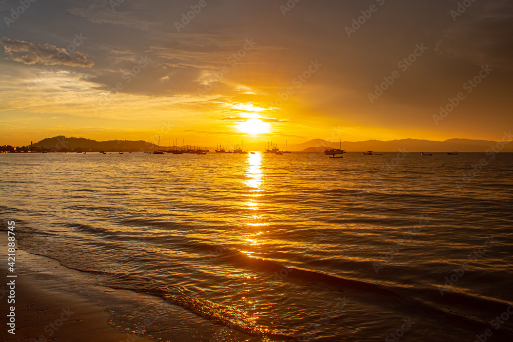 sunset over the sea located on the beach of Cachoeira do Bom Jesus, Canasvieras, Ponta das Canas, Florianópolis, Santa Catarina