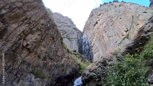 mountain stream with a view of the sky
