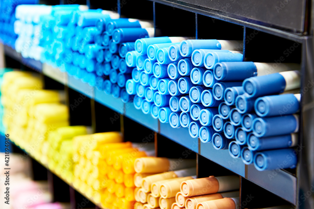 Fototapeta premium Colored blue yellow markers on store