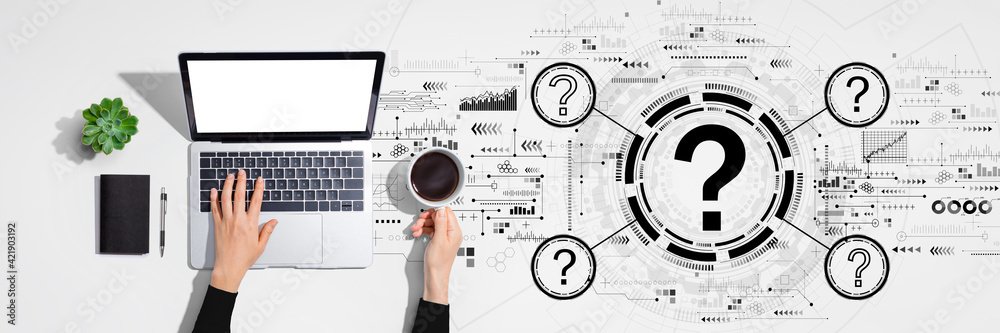 Question marks with person using laptop computer Question marks with person using laptop computer