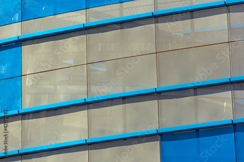 Ventilation panel on the facade of the building. rainscreen. exterior wall. Blue white perforated panels. Metallic modern design  photo