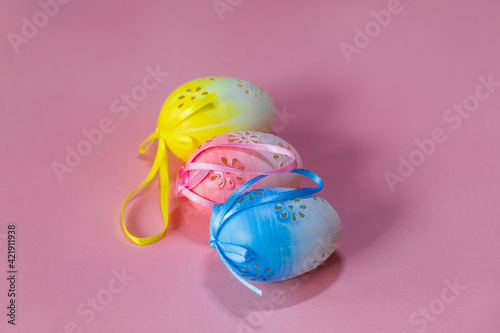 Easter egg as decoration. Decorated Easter eggs on the Easter table. The background is bright. photo