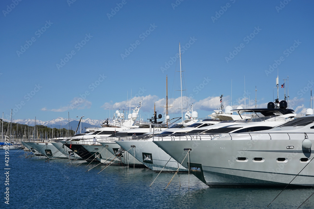 Yachts in the port on the Mediterranean sea. Antibes, France. Yachts in the port on the Mediterranean sea. Antibes, France.