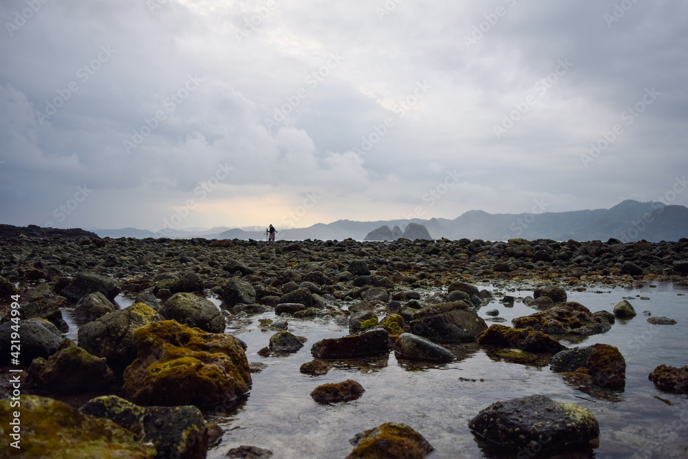 Dramatic landscape of Semeti beach, Lombok, Indonesia during cloudy evening.