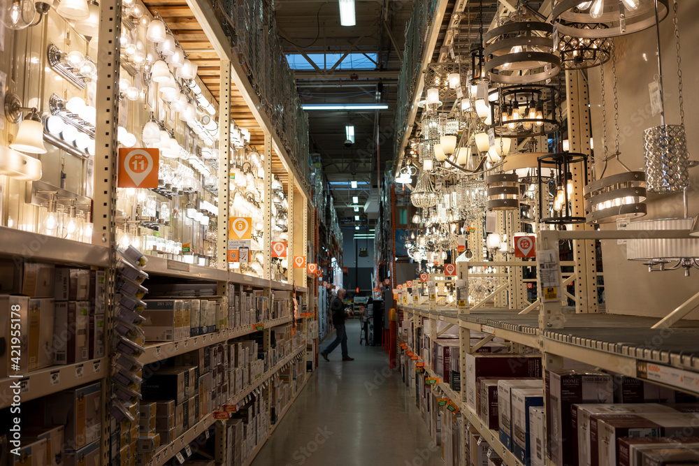 Tigard, OR, USA - Mar 13, 2021: The lighting department aisle in the Home  Depot in Tigard