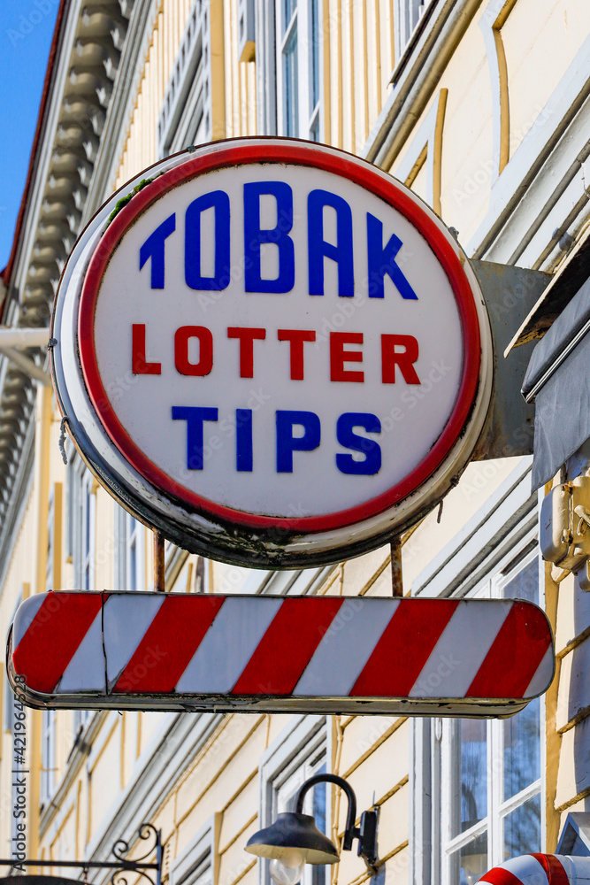 Obraz premium Granna, Sweden A retro sign for tobacco and lottery.