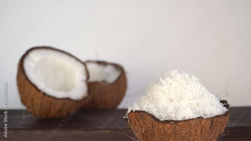 shell filled with coconut shavings. Coco, ripe palm fruit. used in cooking. Confectionery products get not only an attractive appearance, but also a very delicate and pleasant taste. shell filled with coconut shavings. Coco, ripe palm fruit. used in cooking. Confectionery products get not only an attractive appearance, but also a very delicate and pleasant taste.