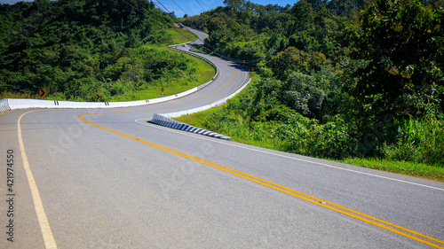 Road no.3 or three or sky road over top of the mountains with green forest in Nan province, Thailand, Asia.