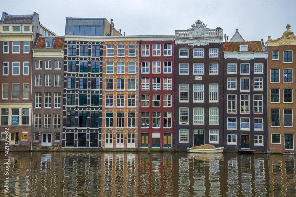 Colorful houses of Amsterdam on a cloudy September day