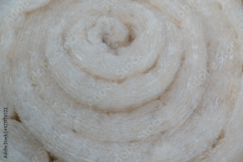 Slika na platnu A roll of synthetic mineral material for thermal insulation of structures in the construction of buildings