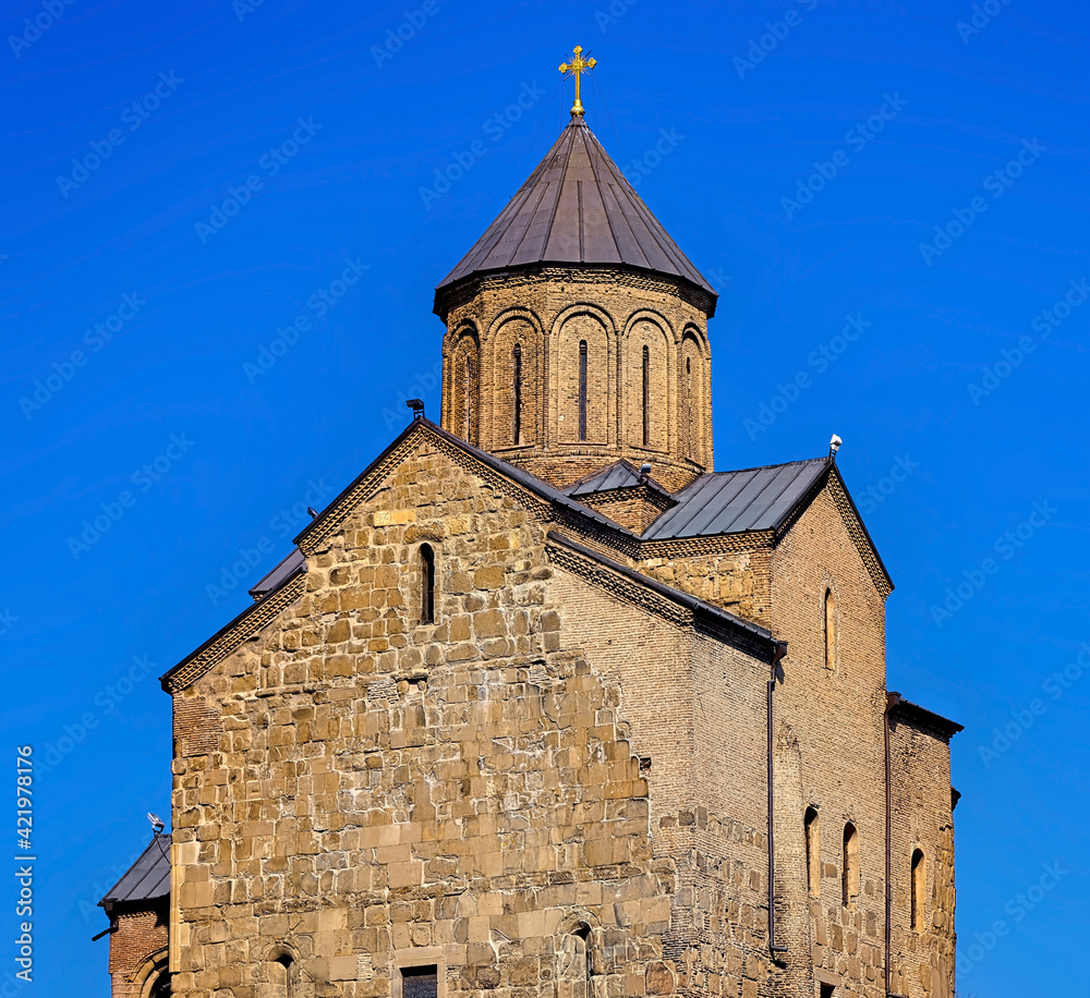 Tbilisi, Georgia - August 20, 2020: Temple on Metekhi rock Tbilisi, Georgia - August 20, 2020: Temple on Metekhi rock