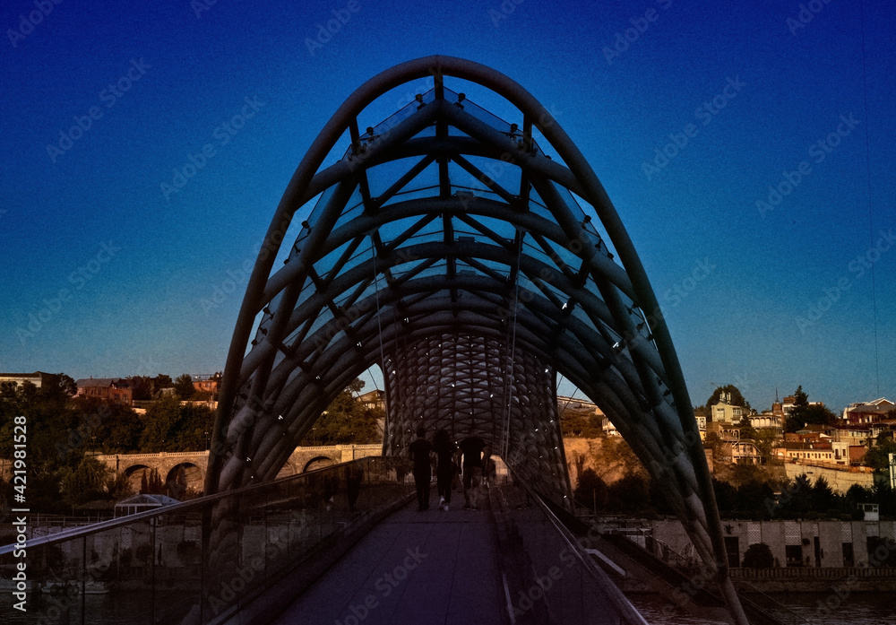 Tbilisi, Georgia - August 20, 2020: Bridge of Peace in the evening