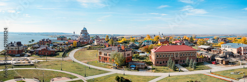 A wide panorama of Sviyazhsk. View of the Russian village with Orthodox churches and the Volga River.