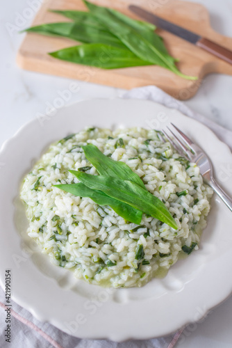 Spring food; Delicious risotto with asparagus and wild garlic