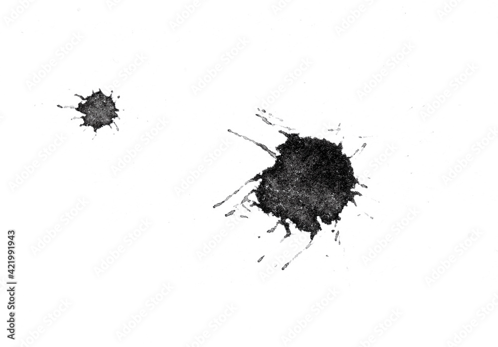 abstract black splashes on white watercolor paper. monochrome image.
