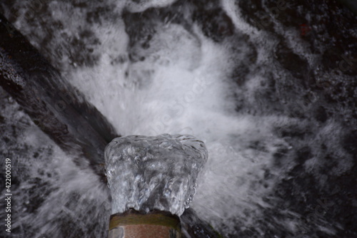 Clear spring water flowing from the mountain