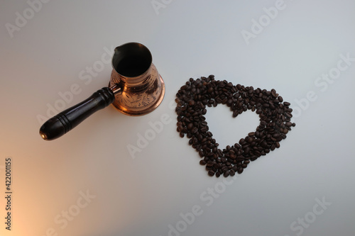 turk and coffee beans in the form of a heart