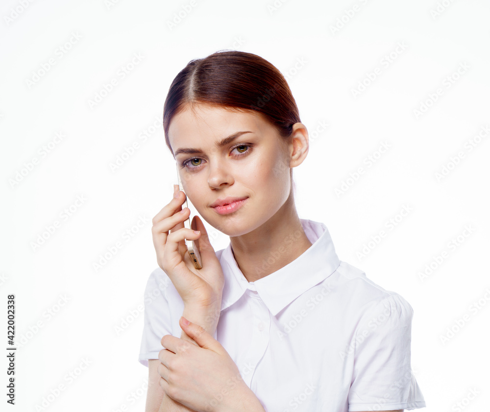 pretty woman in shirt with phone in hands technology secretary office pretty woman in shirt with phone in hands technology secretary office