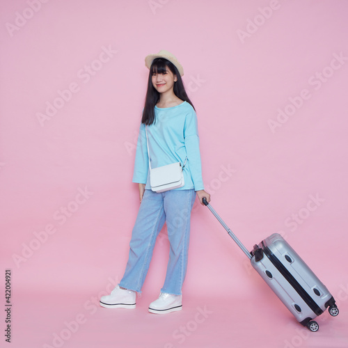 Woman with suitcase. Vacation travel