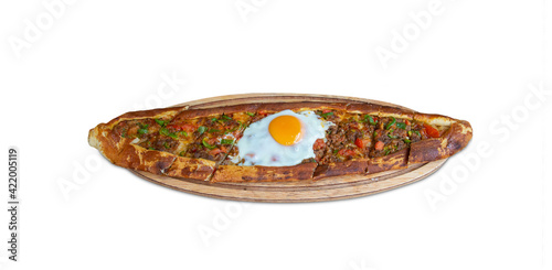 Turkish food pita with minced meat and eggs, top view, isolated on white background photo