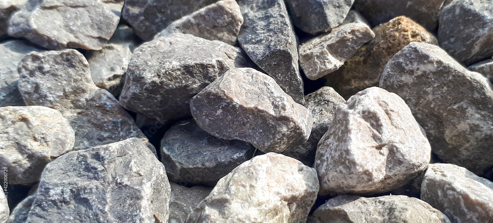 Gravel outdoor  road. Closeup gravel texture. Stone pattern. Small rocks ground background
