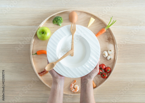 фотографія Intermittent fasting IF diet concept with 8-hour clock timer for eating nutritio