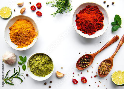 Fototapeta Naklejka Na Ścianę i Meble -  Various spices isolated on white background, top view