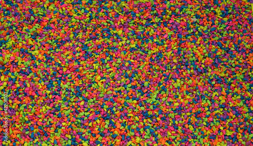 Vivid and colorful pebbles are for background, textures, arts,  handicraft and decorations.
