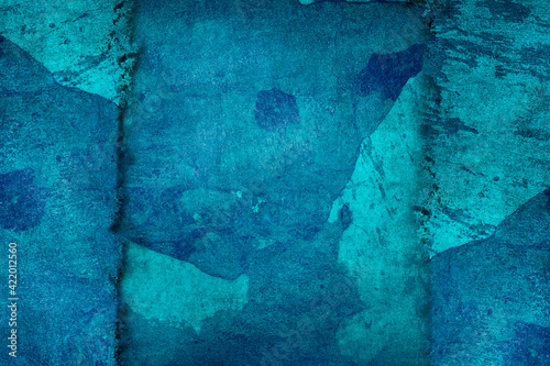 Blue  cracked  shabby texture of an old wall. Backgrounds.