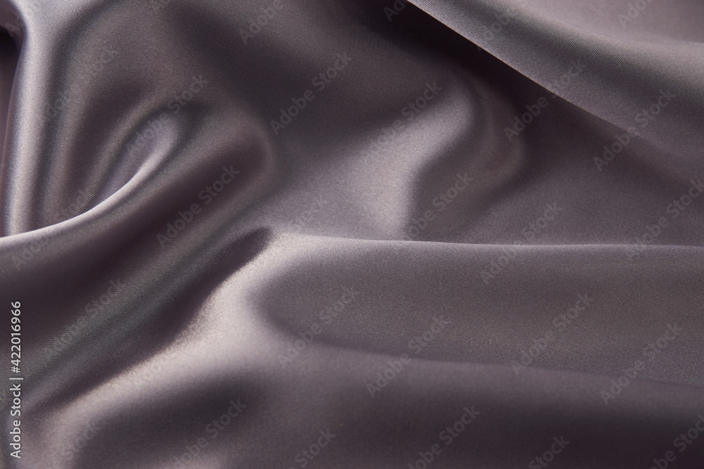 Obraz premium Gray silk fabric background, top view, close-up