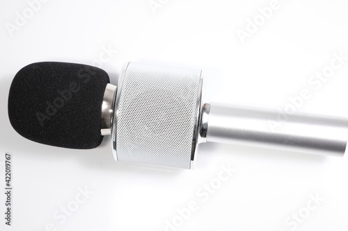 A close up of a microphone that can be used for karaoke aswell photo