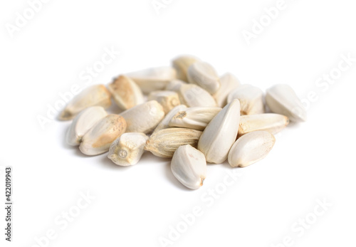 Safflower or Carthamus tinctorius seeds. Isolated on white background.