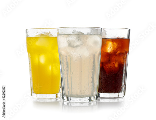 Delicious refreshing drinks in glasses on white background