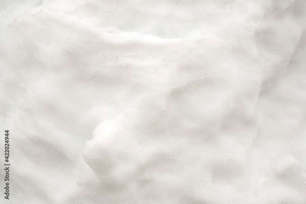 Abstract white background. Snow surface texture. Macro.