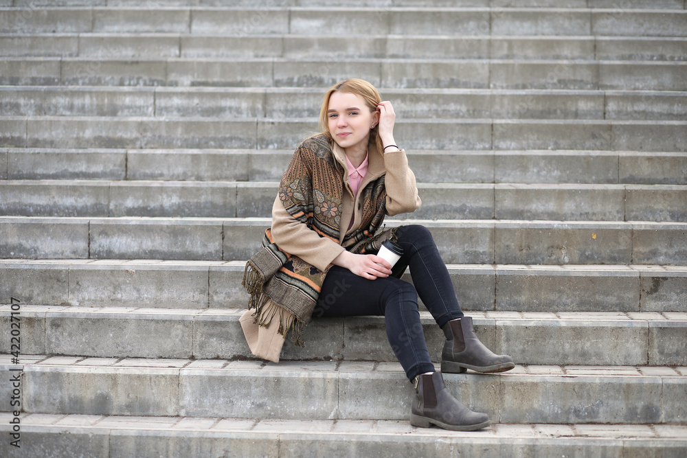 Cute blonde in the city drinking coffee Cute blonde in the city drinking coffee